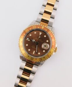 Rolex GMT-Master II 16713 Tiger Eye , Steel/Yellow Gold, Box/Paper